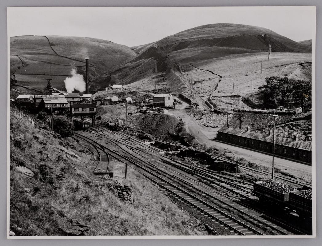 General view of Glyncorrwg Colliery showing old screens and sidings in foreground, and site for new washery, October 1952.