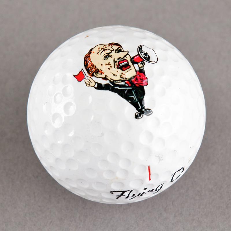 Golf ball with caricature of Neil Kinnock. Sold during 1984-85 Miners&#039; Strike.