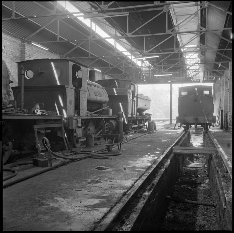 Black and white film negative showing locomotives inside a locomotive shed, Mountain Ash.  &#039;Mountain Ash locos&#039; is transcribed from original negative bag.