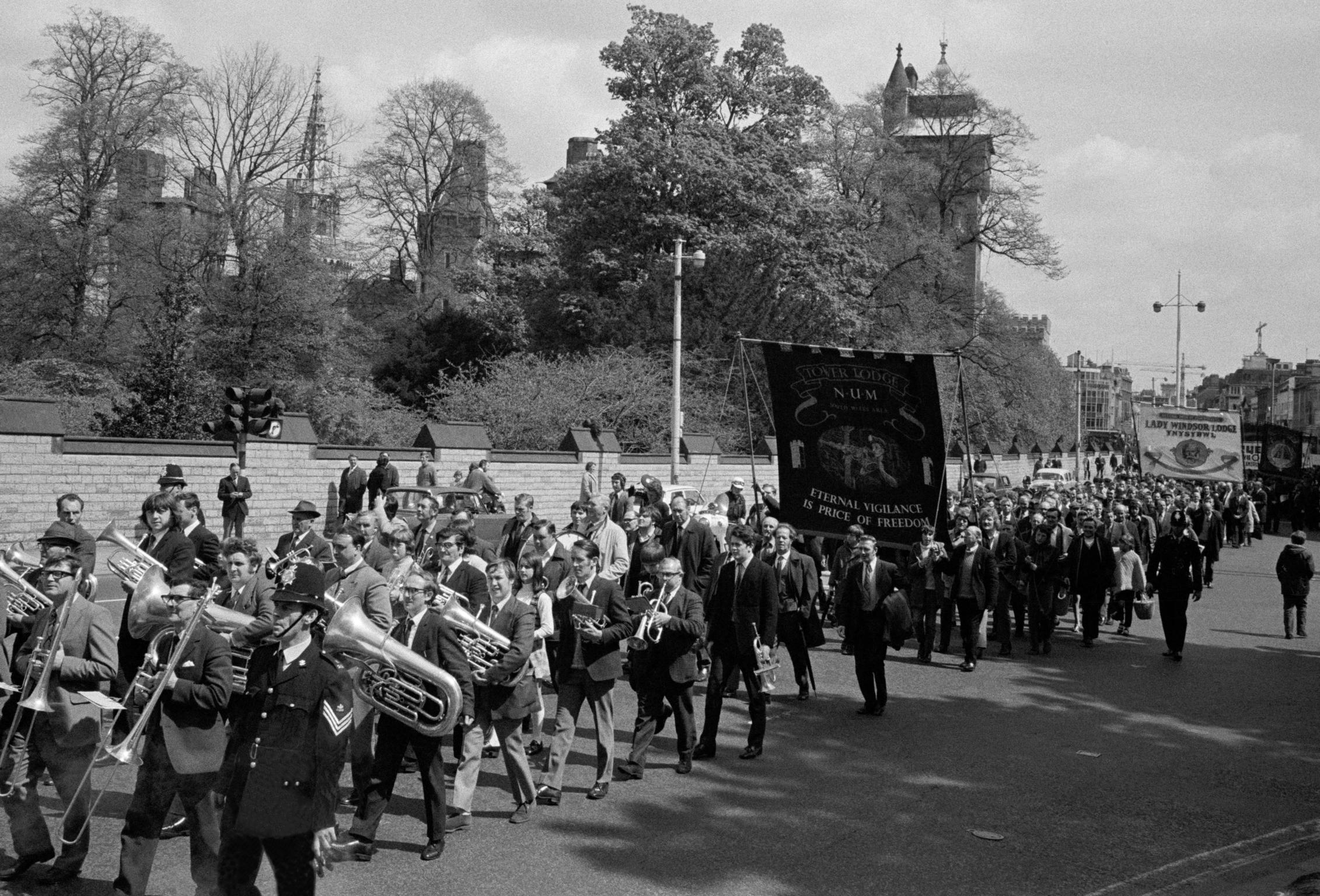 National Union of Miners march through the center of Cardiff, Wales