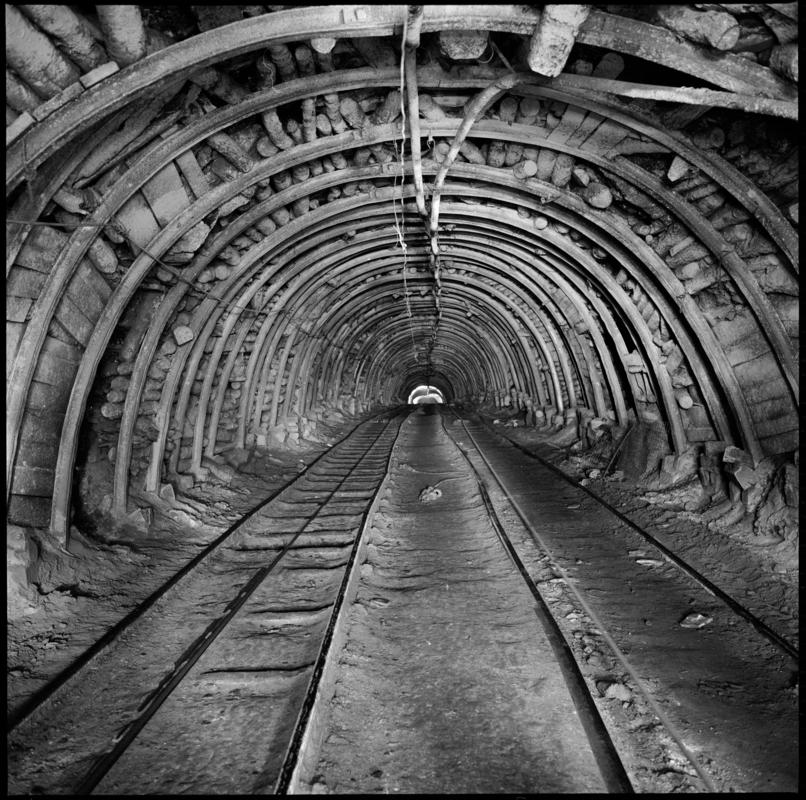 Black and white film negative showing an underground roadway, Deep Duffryn Colliery 1978.  &#039;Deep Duffryn 1978&#039; is transcribed from original negative bag.