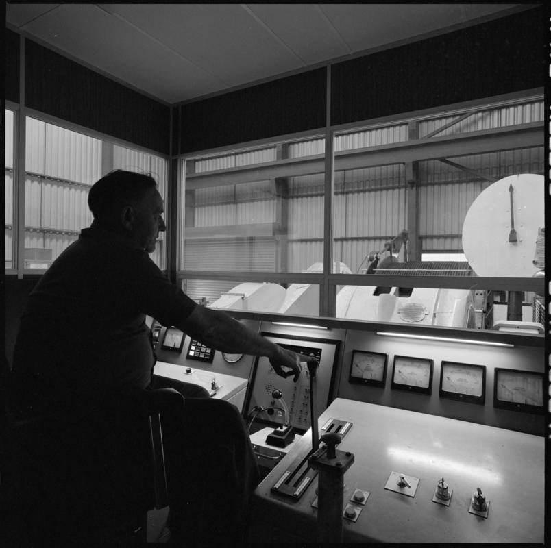 Black and white film negative showing the winding engine driver&#039;s cab, Betws Mine.