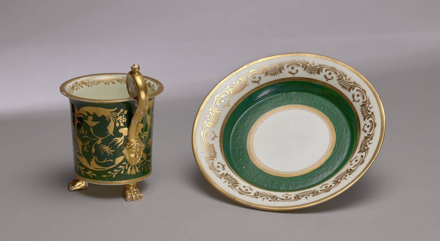 Cup, cabinet and saucer