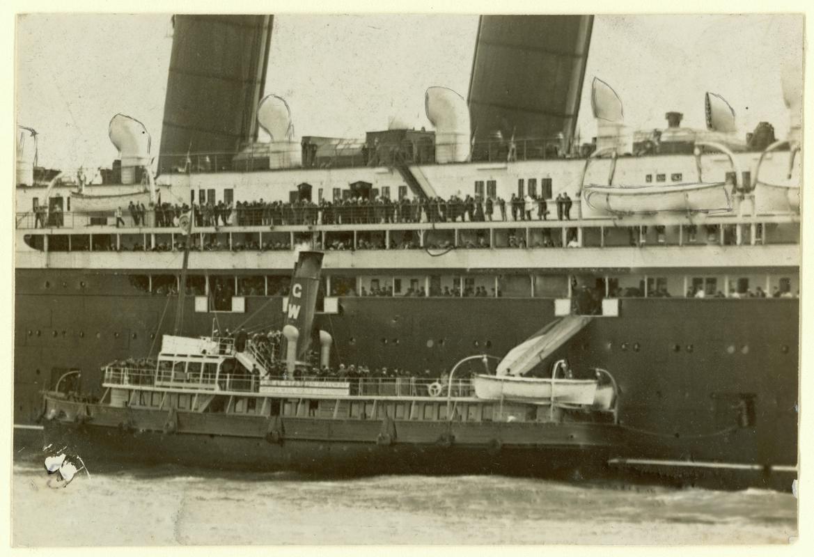 S.S. SANEATON taking the mail from the R.M.S.  MAURETANIA.