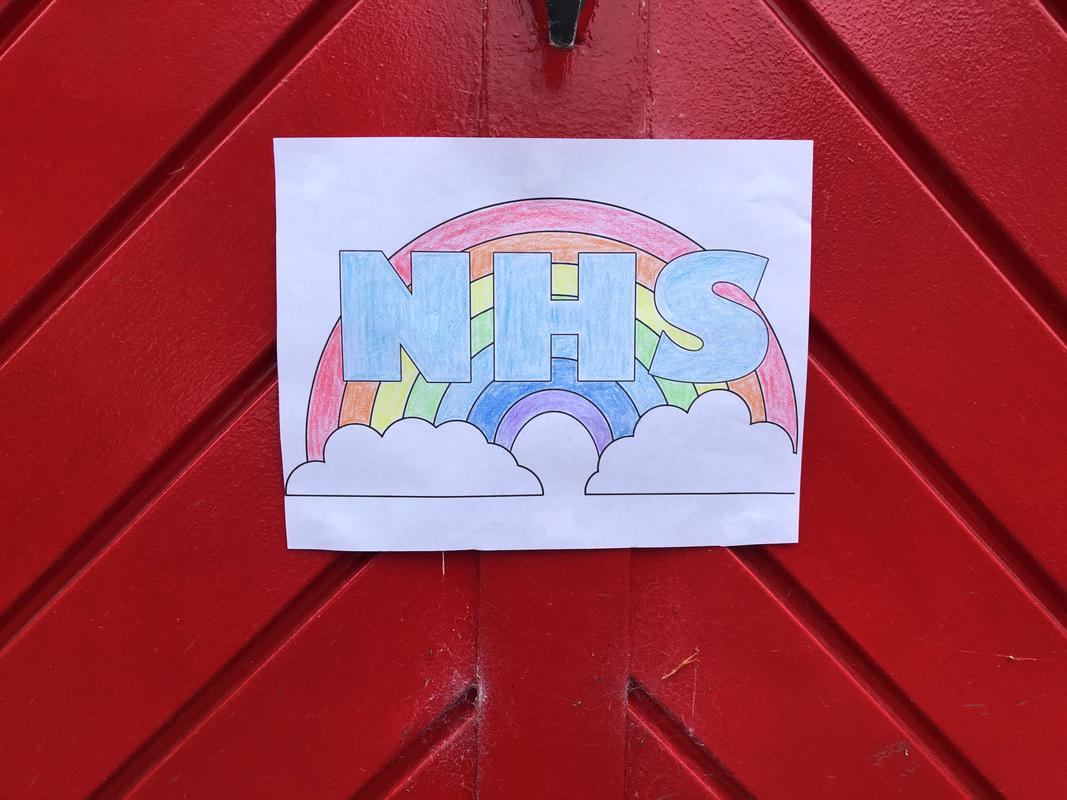 NHS&#039; drawing on the door of a house in Caerwent