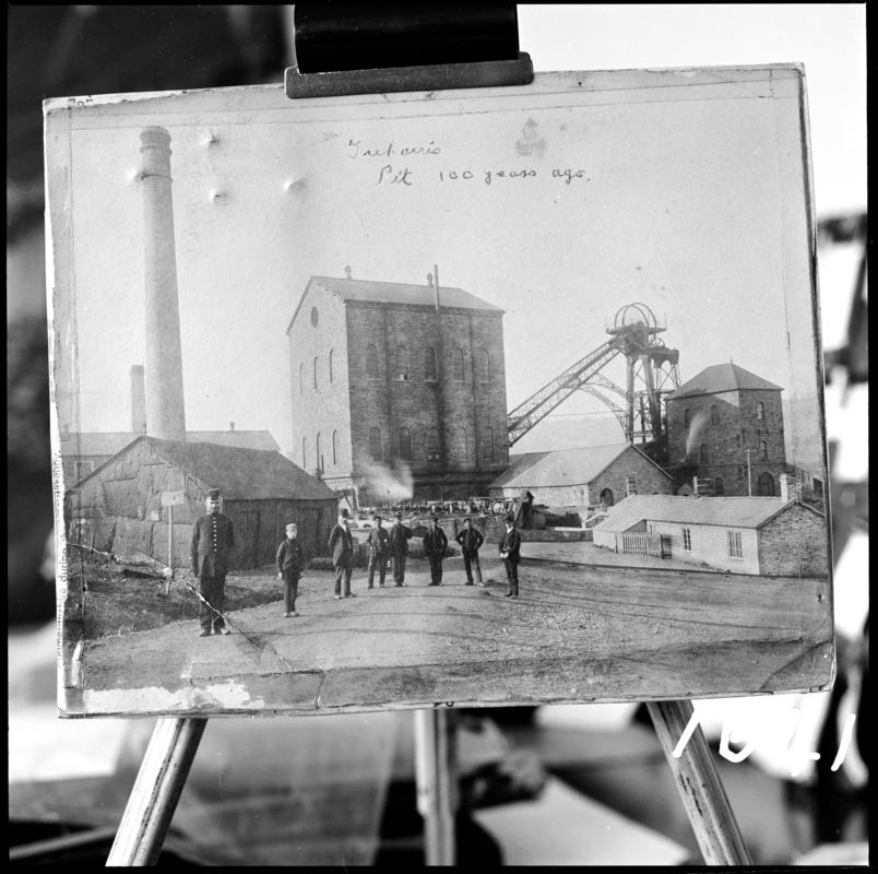 Film negative of a photograph showing a general surface view of Deep Navigation Colliery in 1878.  The engine house housed the vertical winder.  The figure on the left is the colliery policeman.