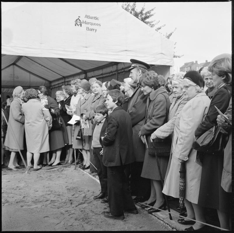 Black and white film negative showing the unveiling ceremony of the Senghenydd memorial, commemorating the 1913 Universal Colliery explosion.  The negative is undated but the ceremony took place in October 1981.  &#039;Senghenydd&#039; is transcribed from original negative bag.