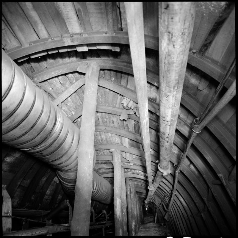 Black and white film negative showing underground roof prop supports, Merthyr Vale Colliery 2 July 1981.  &#039;2 Jul 1981&#039; is transcribed from original negative bag.