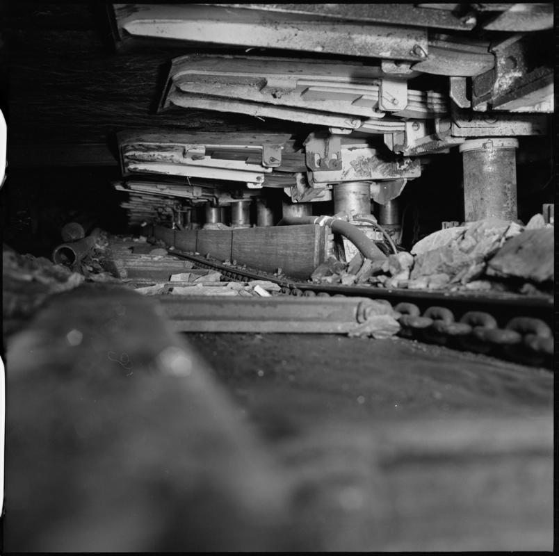 Black and white film negative showing the new coal face in the process of installation in the Garw Seam, Blaenserchan Colliery 1978-9.