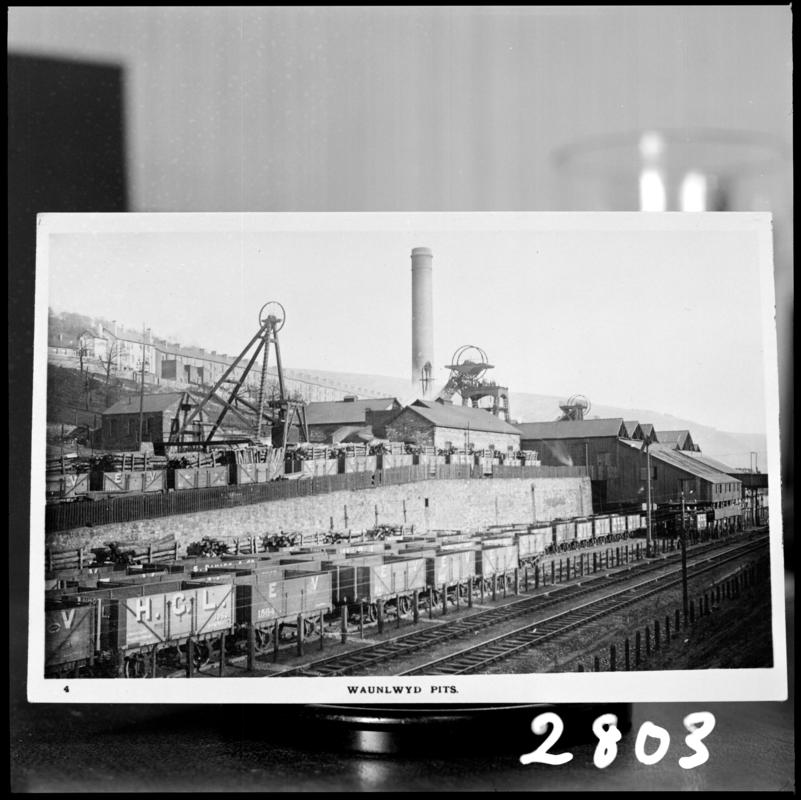 Black and white film negative of a photograph showing a surface view of Waunlwyd Colliery c.1900.  &#039;Waunlwyd&#039; is transcribed from original negative bag.