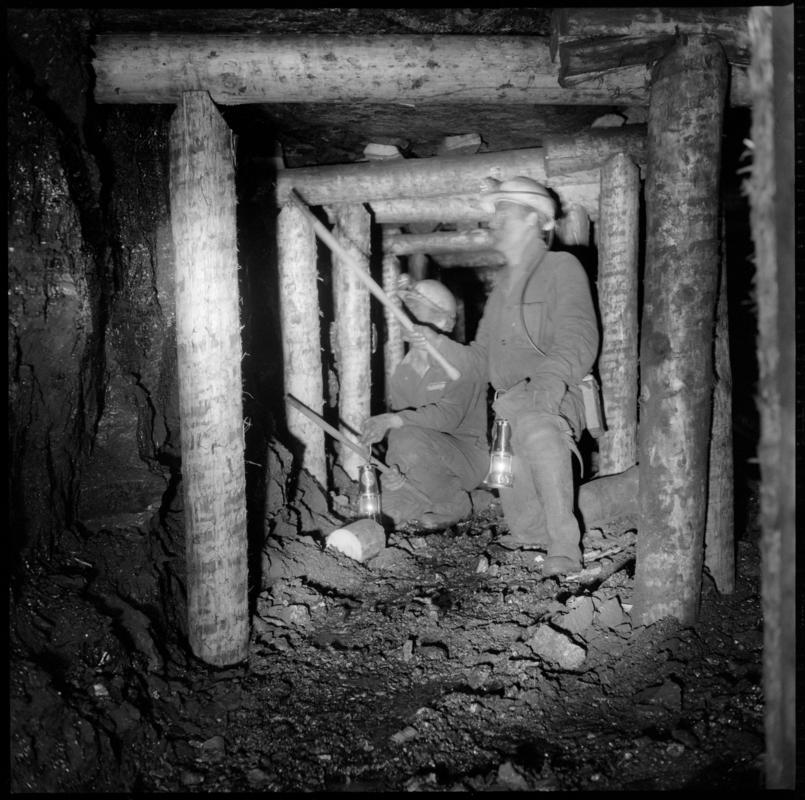 Black and white film negative showing men preparing timber on the face, Ammanford Colliery 7 September 1976.  &#039;Ammanford 7 Sep 1976&#039; is transcribed from original negative bag.