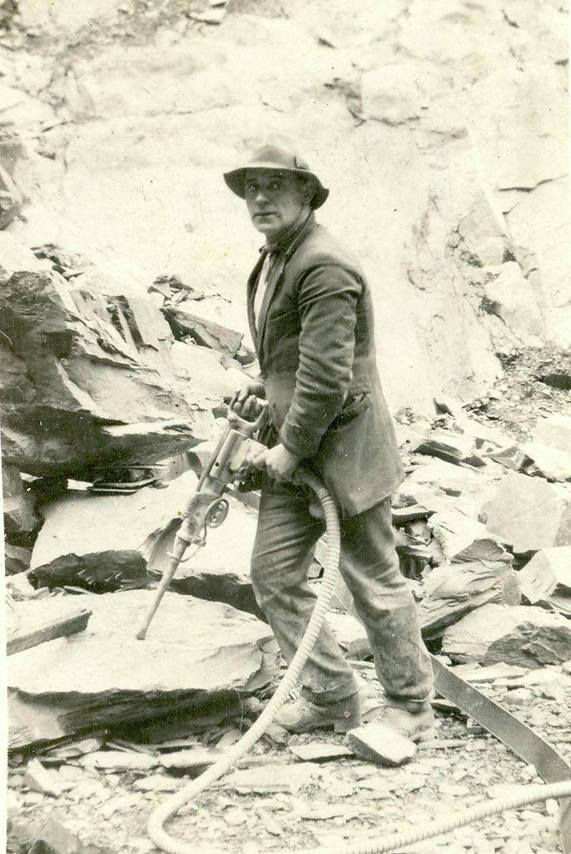 Quarryman using a rock drill (with compressed air) at Dinorwig Quarry