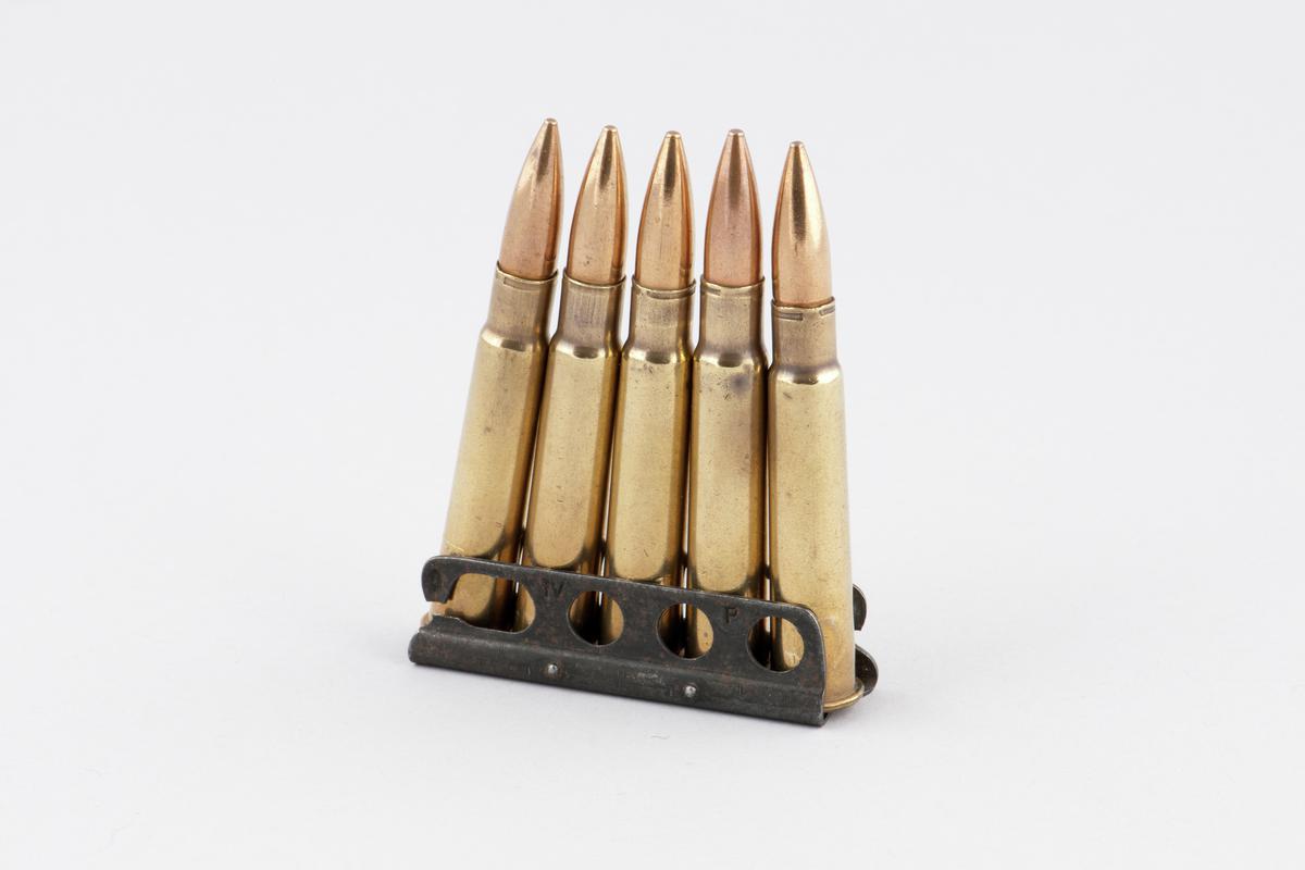 Clip of 5 inert bullets of .303 tracer ammunition.