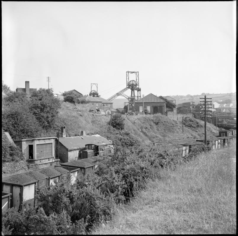 Black and white film negative showing a surface view of Deep Navigation Colliery 1975.  &#039;Deep Navigation Treharris 1975&#039; is transcribed from original negative bag.