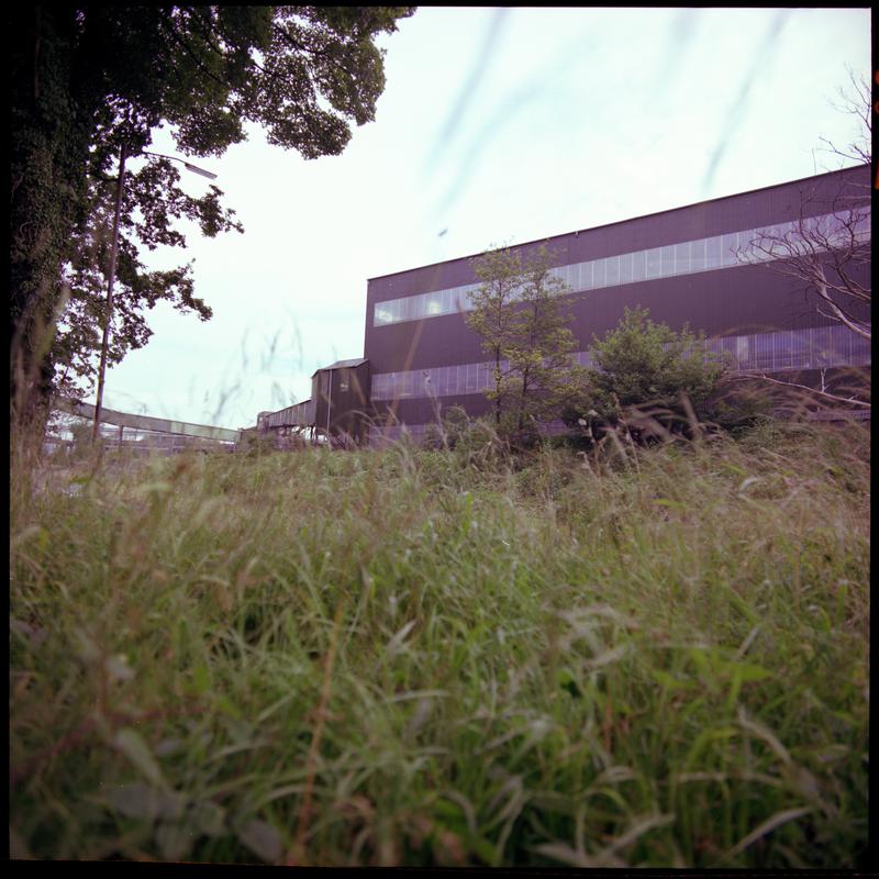 Colour film negative showing a surface view of Aberpergwm Colliery.  &#039;Aberpergwm&#039; is transcribed from original negative bag.  Appears to be identical to 2009.3/1896.