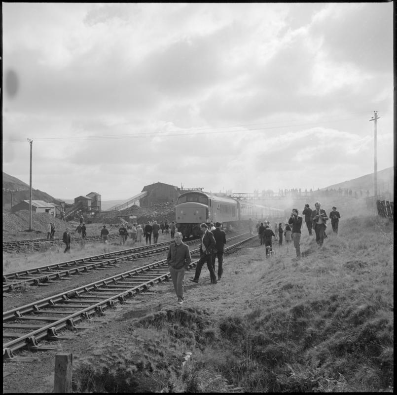 Black and white film negative showing a train passing the washery, Big Pit Colliery.
