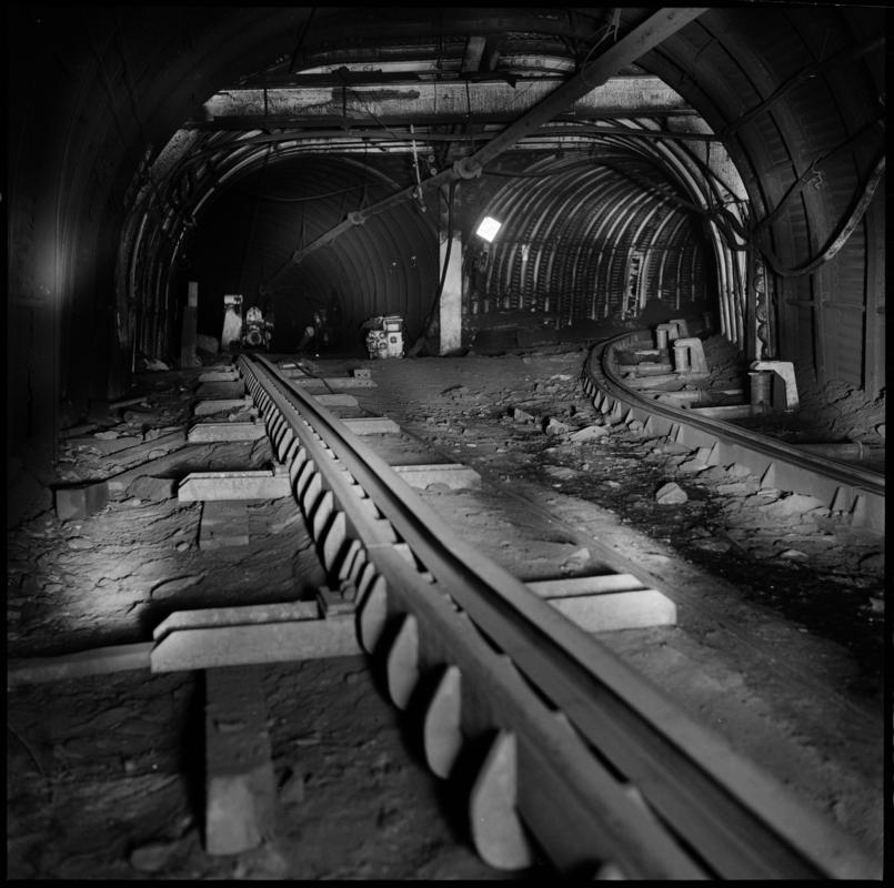 Black and white film negative showing an underground junction, Aberpergwm Colliery 1978.  &#039;Aberpergwm 1978&#039; is transcribed from original negative bag.