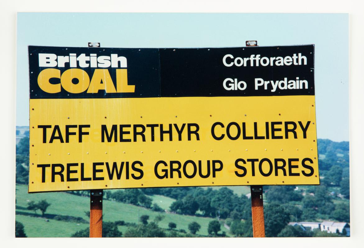 A photograph of the Taff Merthyr Colliery / Trelewis Group Stores entrance sign.