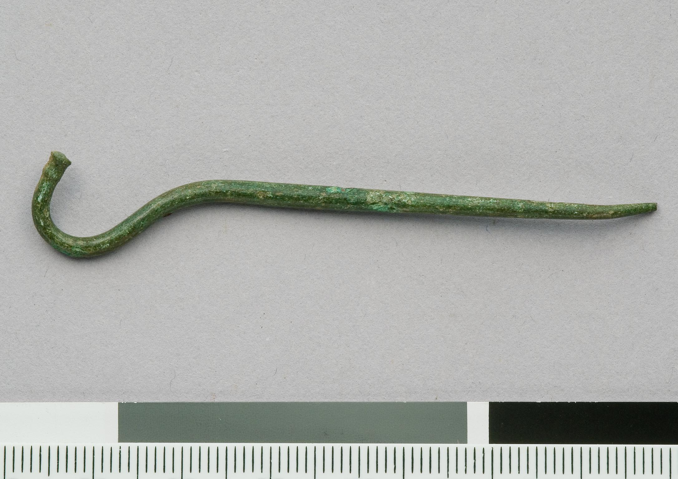 Early Iron Age bronze swans neck pin