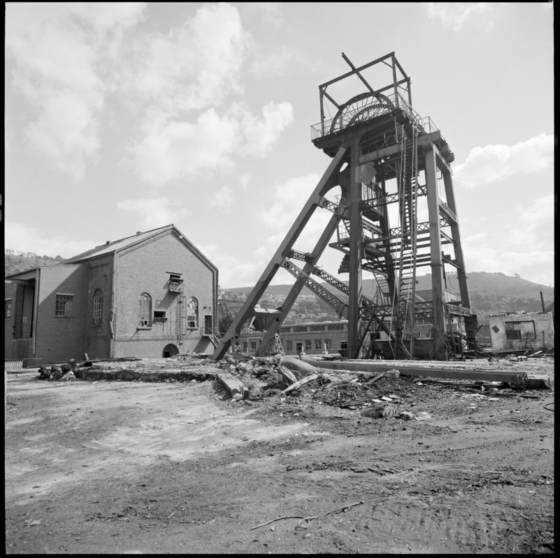 Black and white film negative of a photograph showing demolition at Celynen South Colliery, 1985.