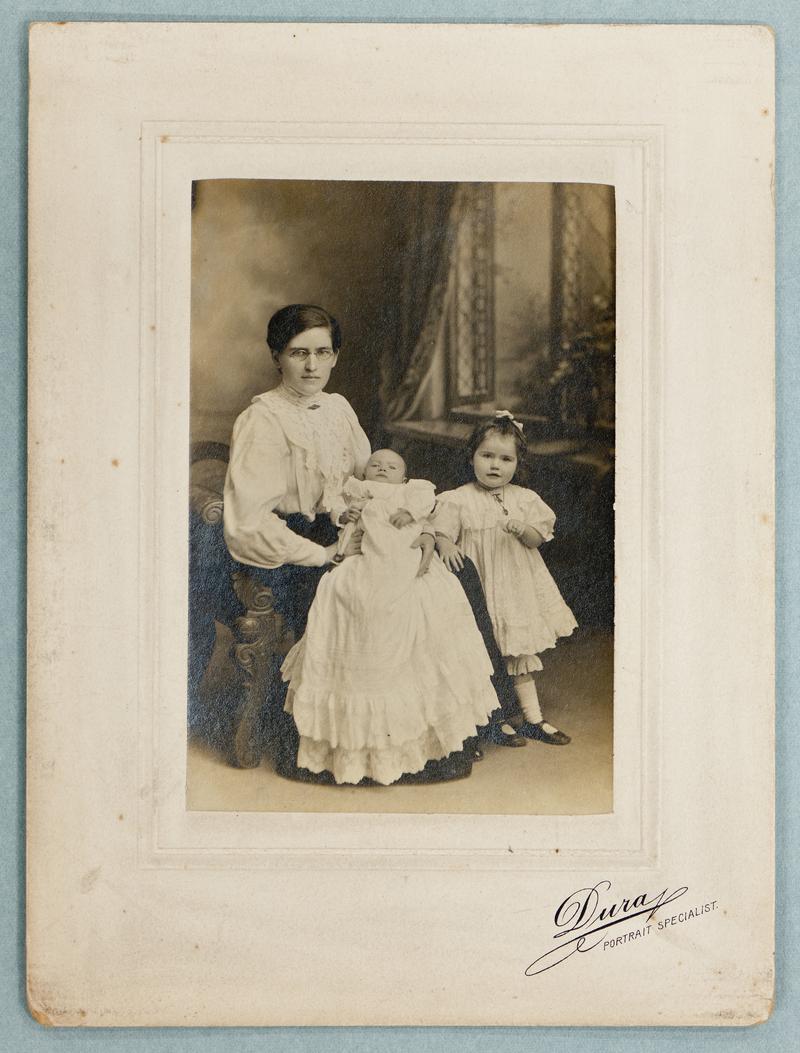 Studio portrait of Mrs Jane Howells and her children, 1907.