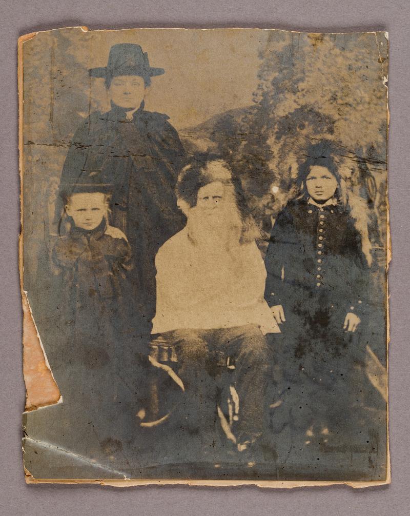 Group photograph of Dr. William Price and members of his family.