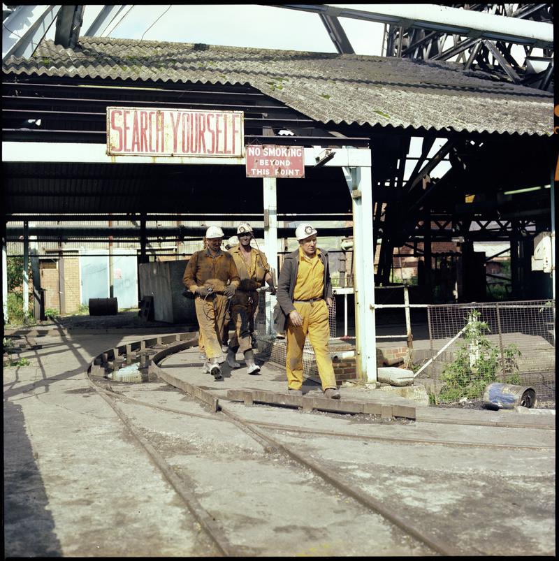 Colour film negative showing miners on the surface, Merthyr Vale Colliery.  &#039;Merthyr Vale&#039; is transcribed from original negative bag.