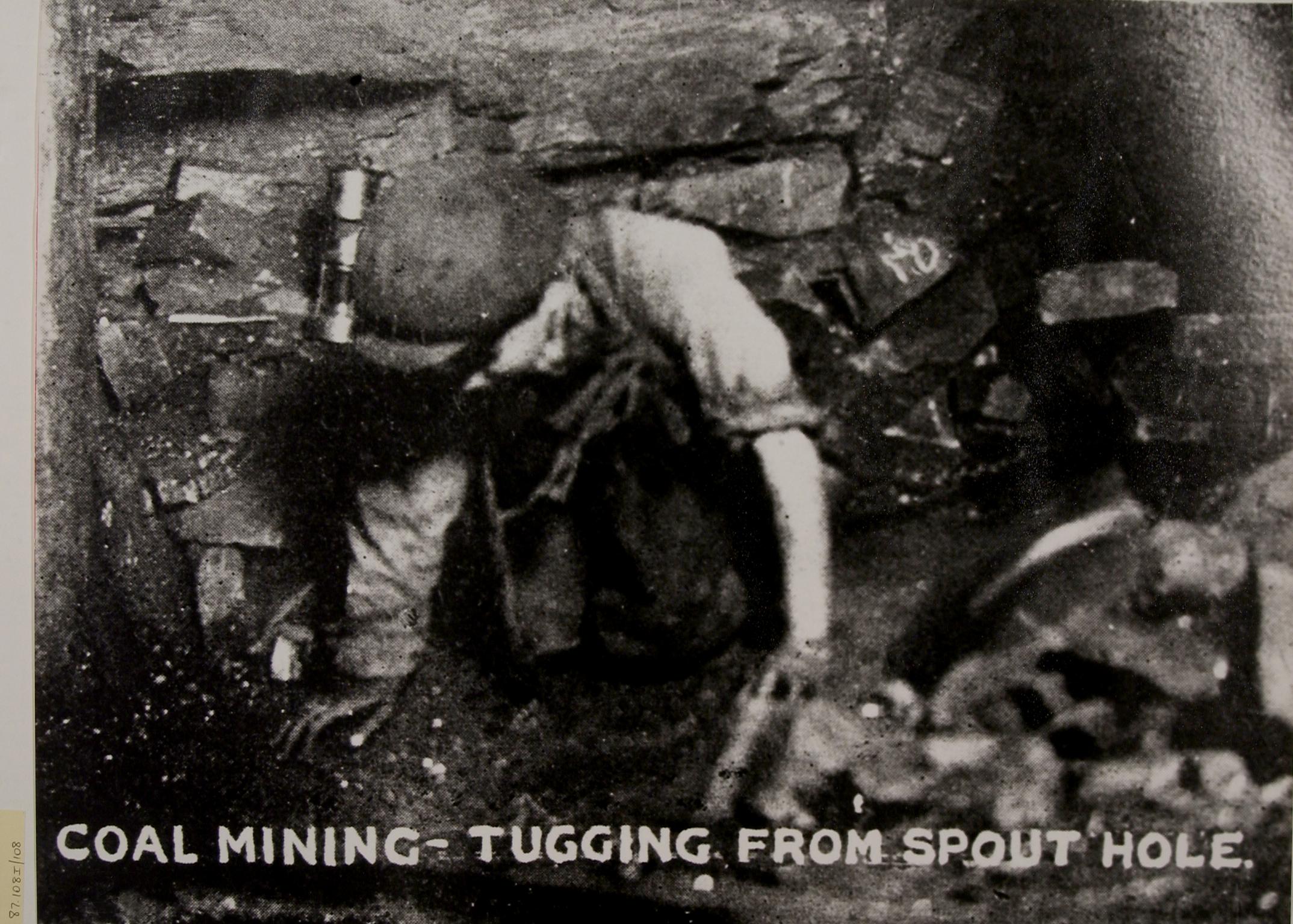 Miner underground, photograph