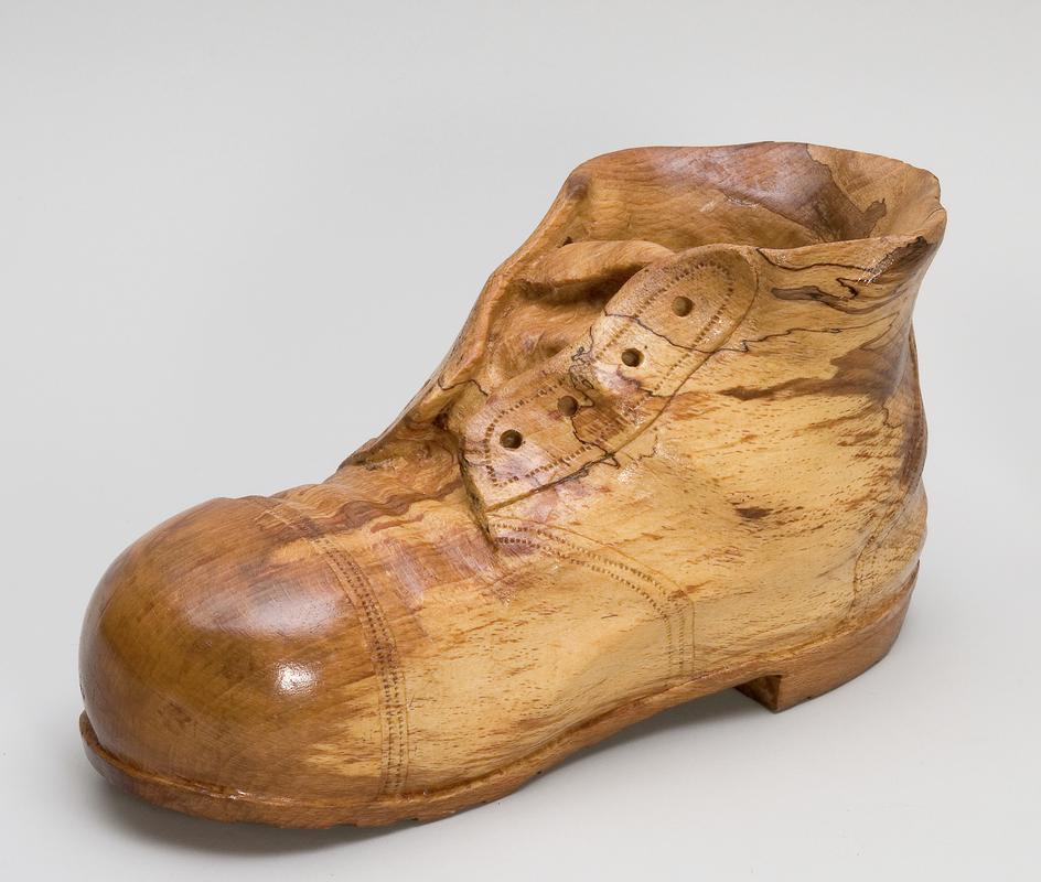 Carved wooden coal miners boot