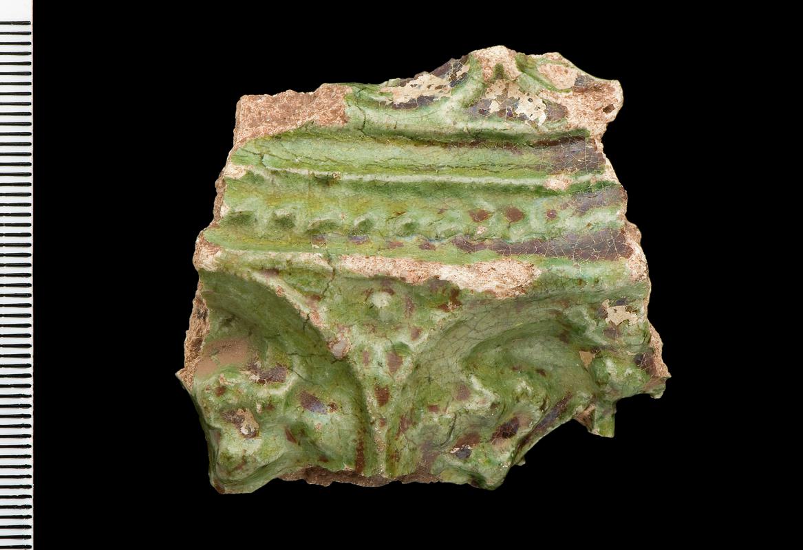 Fragments of green-glazed stove tile
