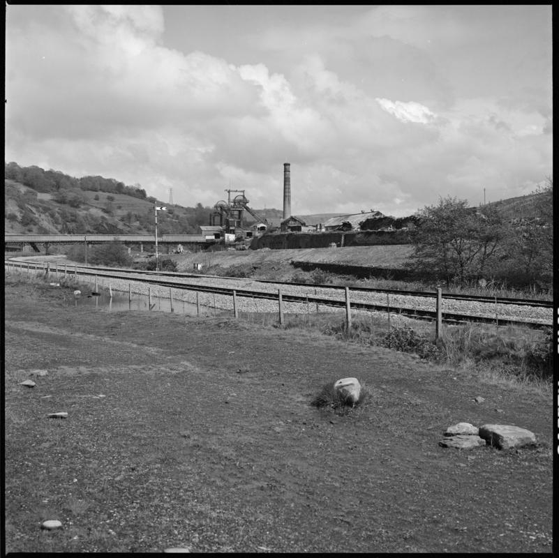 Black and white film negative showing a view towards Lewis Merthyr Colliery.  Appears to be identical to 2009.3/2704.