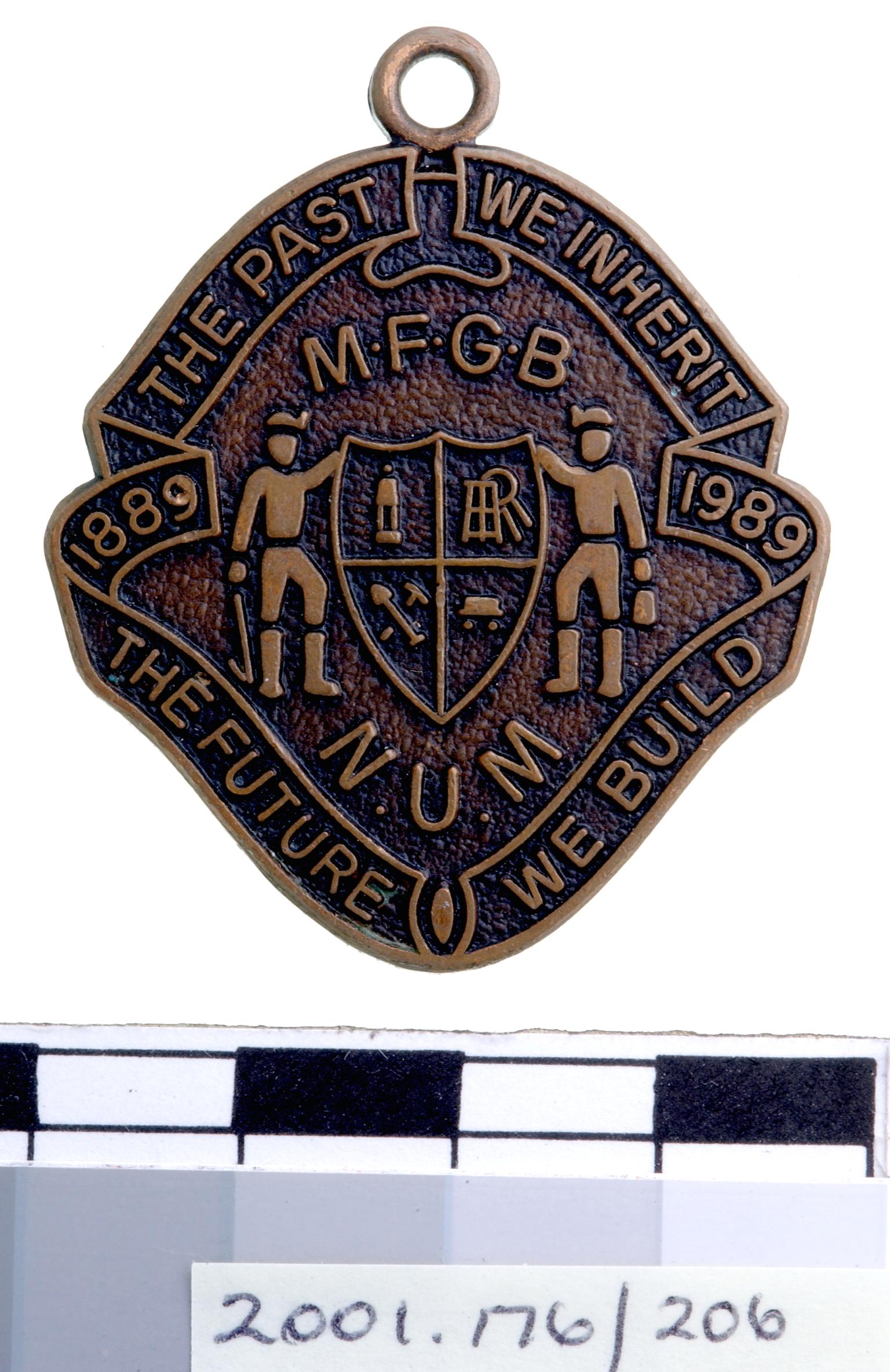 M.F.G.B. / N.U.M. 1889-1989, badge