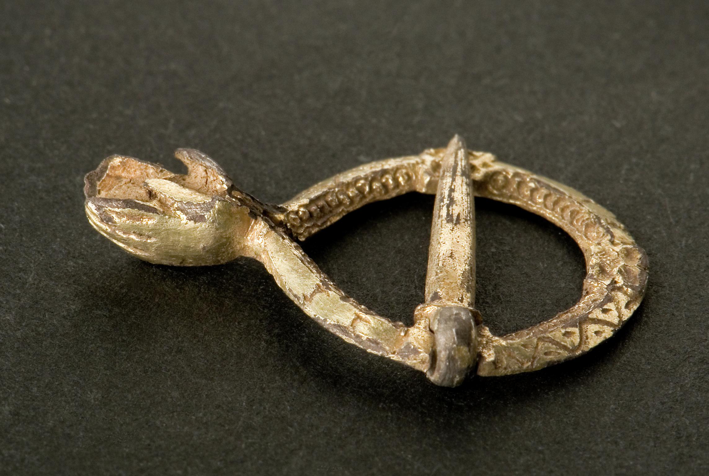 Medieval silver brooch