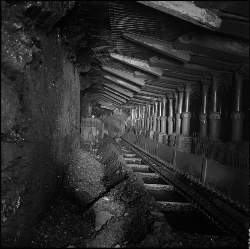 Black and white film negative showing powered supports and shearer on V44s face in the Gellideg seam, Deep Duffryn Colliery 1978.  &#039;Deep Duffryn 1978&#039; is transcribed from original negative bag.