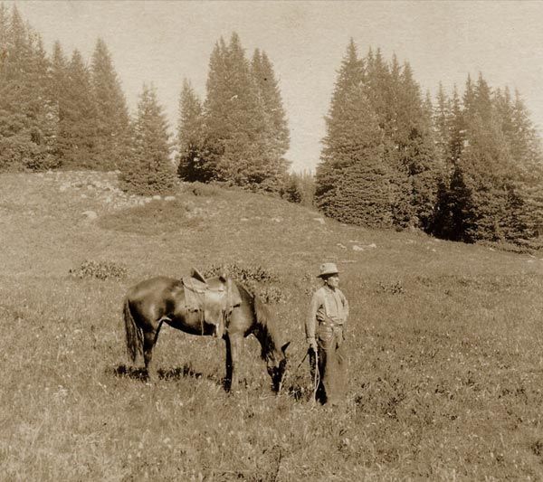 An American conchologist, Junius Henderson, collecting molluscs in Colorado