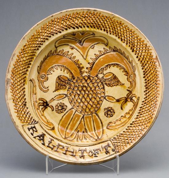 Slipware dish with double-headed eagle, made by Ralph Toft, Staffordshire, about 1663-88.