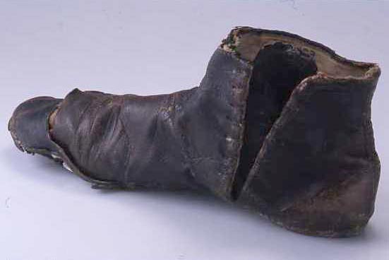 Adult's left boot, used as lucky charm under floorboards at Old Gwernyfed, Felindre, Brecon.