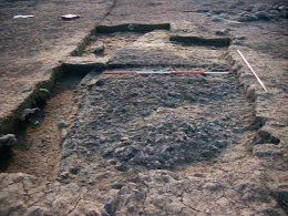 The possibly prehistoric charred feature in Mark Lewis' trench