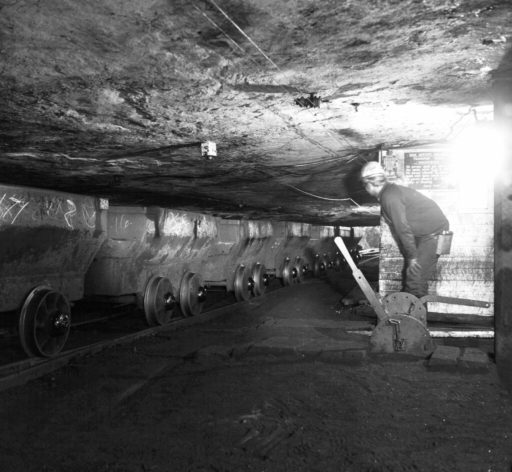 Graig Merthyr Colliery, line of drams in the Graigola Seam - note the unsupported sandstone roof, c.1977