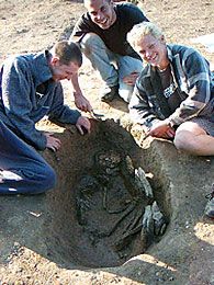 The burial in Mark's trench.