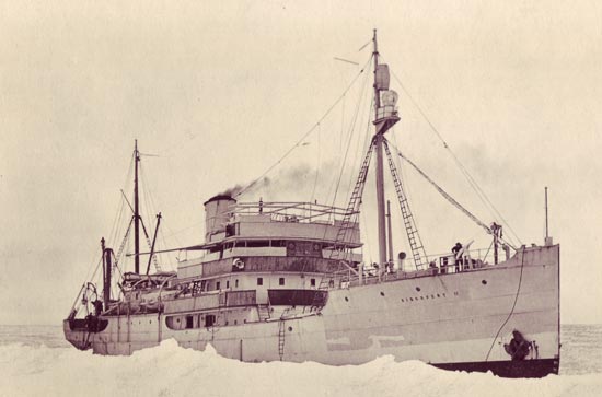 Royal Research Ship <em>Discovery II</em> in loose pack ice, Bouvet Island, Southern Ocean, 1926.