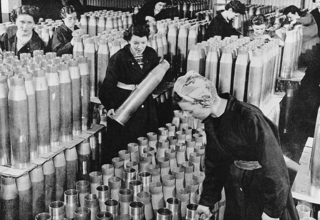Women manufacturing ammunition shells, c1939 (b/w photo)