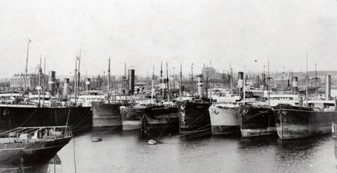 Barry docks, c.1910, with ships moored to buoys waiting to load coal.