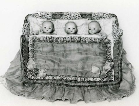 Set of three miniature <em>bisque</em> dolls, c.1920-25