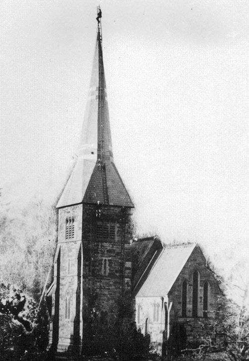 Repairing the spire of Llandygwydd Church.