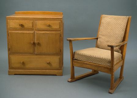 Talybont cupboard-chest and Ynysddu armchair by the Brynmawr Furniture Company.