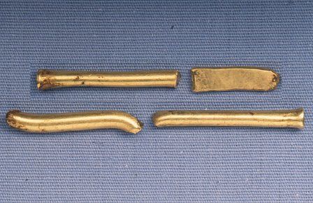 The fragments of bracelets, probably made from Irish gold.