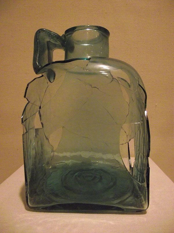 A stamped glass bottle with makers mark attracted the attention of Penny. 