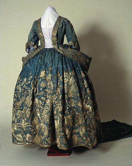 Silver embroidered blue damask court mantua (an open fronted gown with an elaborate train), made in the 1720s.