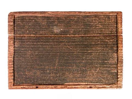 The first 'page' of a Roman will found near Trawsfynydd in the 19th century. The tablet was already broken in two.